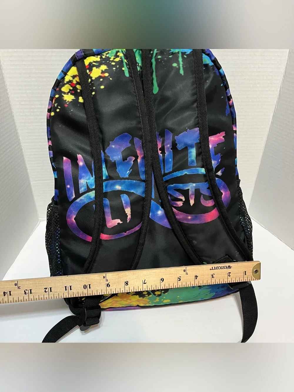 Infinite STS Graphic Black Backpack with Neon Paint-Splash